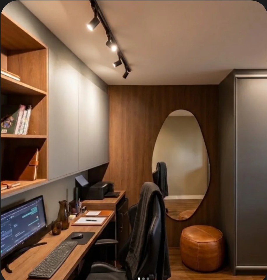 Home office integrado com espelho oval